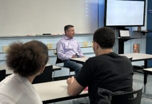 An image of Marc Wood talking infront of students at his Pathfinders visit at English High School